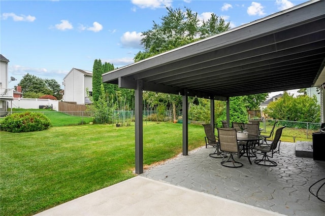 view of patio featuring outdoor dining area and a fenced backyard