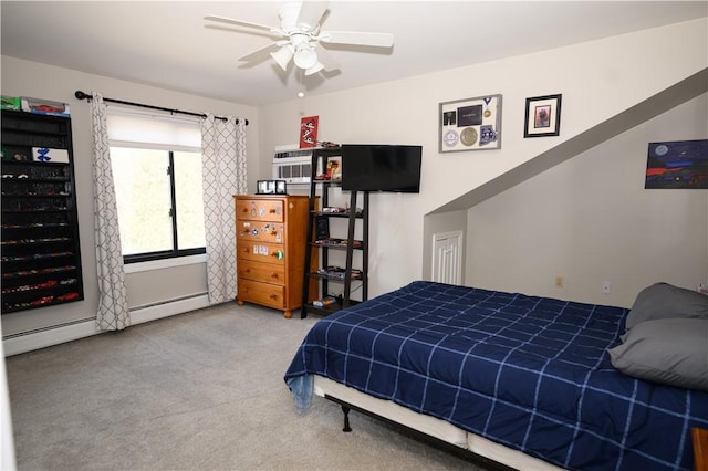 bedroom featuring carpet flooring, baseboard heating, and ceiling fan