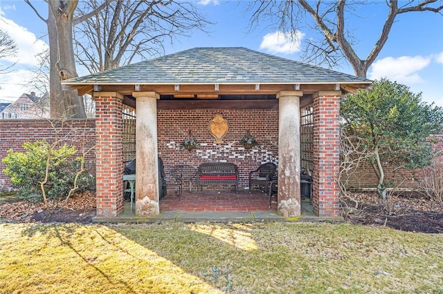 view of patio / terrace with a gazebo and a grill
