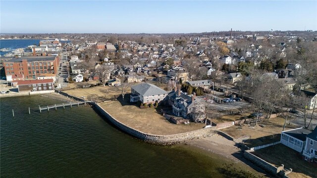 birds eye view of property featuring a residential view and a water view