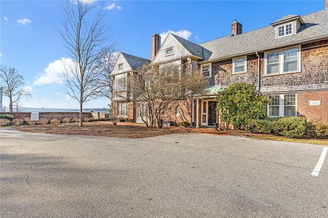 shingle-style home with a chimney