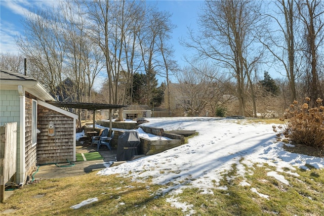 view of yard layered in snow