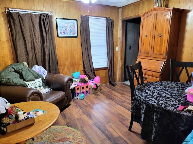 interior space featuring wooden walls and wood finished floors