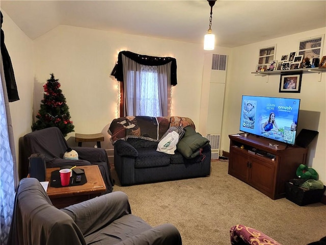 living area with carpet and visible vents