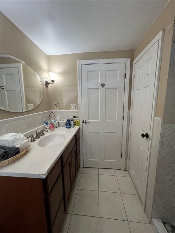 bathroom featuring vanity and tile patterned flooring