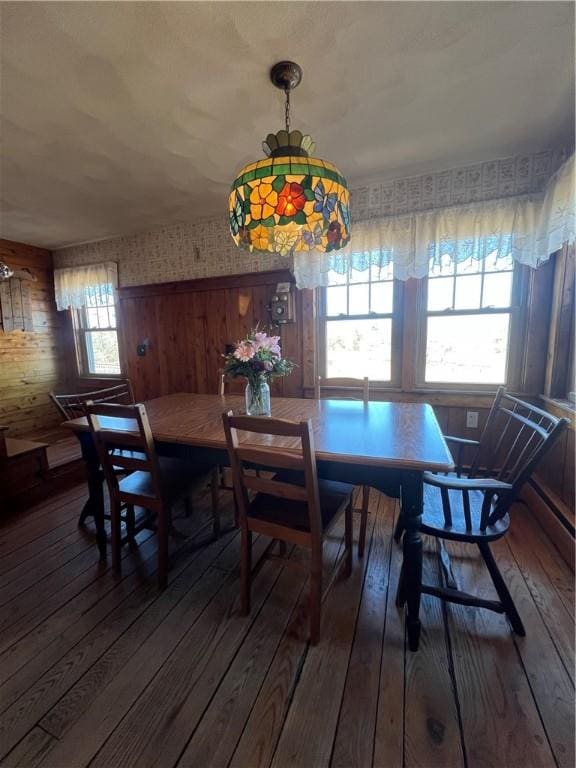 dining room with wood-type flooring