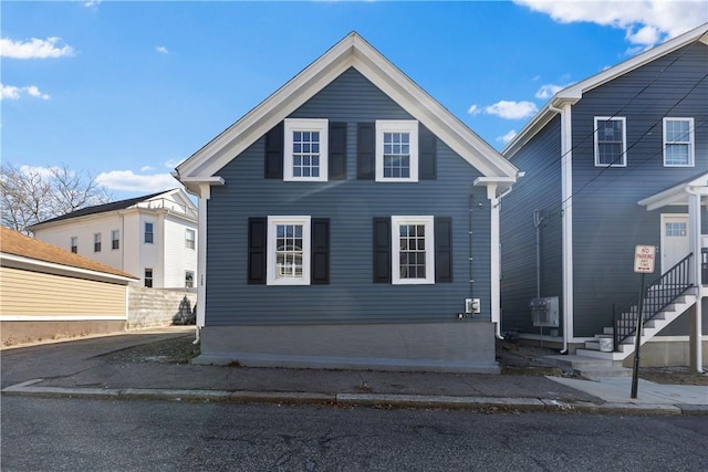 view of front of home with entry steps