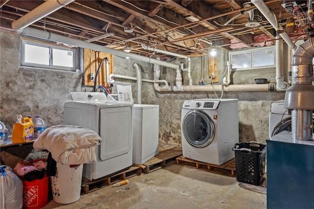 below grade area featuring washing machine and dryer