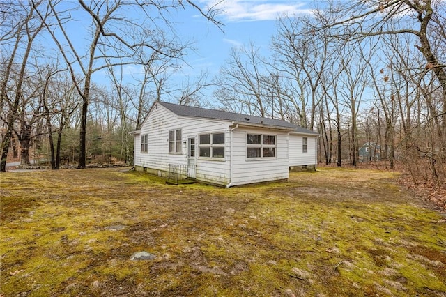 exterior space with a lawn