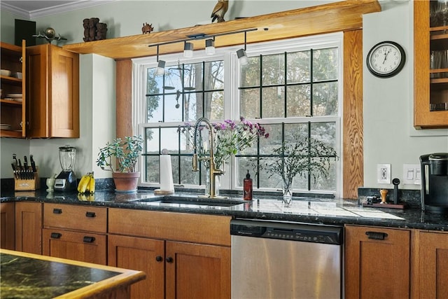 kitchen featuring dishwasher, crown molding, brown cabinetry, and a sink