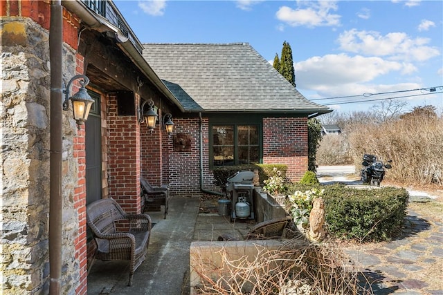 view of patio with a grill