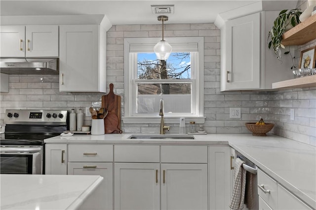 kitchen featuring a sink, under cabinet range hood, appliances with stainless steel finishes, white cabinetry, and open shelves