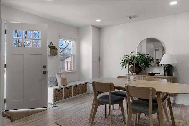 dining space featuring recessed lighting, light wood-style flooring, and visible vents