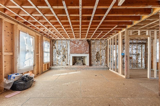 unfurnished living room with a fireplace