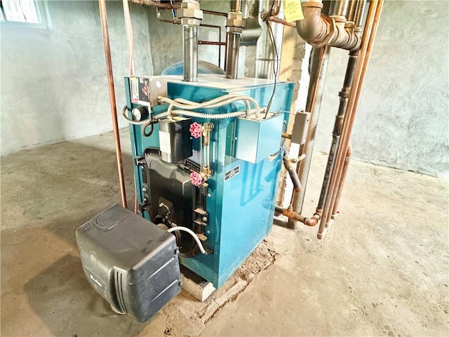 utility room featuring a heating unit