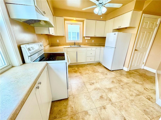 kitchen featuring a ceiling fan, a sink, white appliances, under cabinet range hood, and light countertops