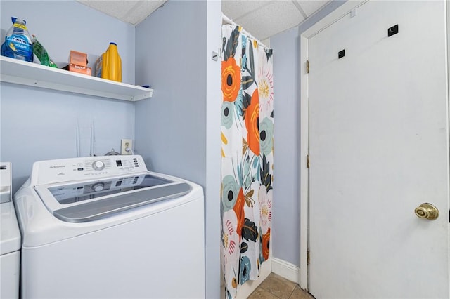 washroom with tile patterned flooring, laundry area, and washer / clothes dryer