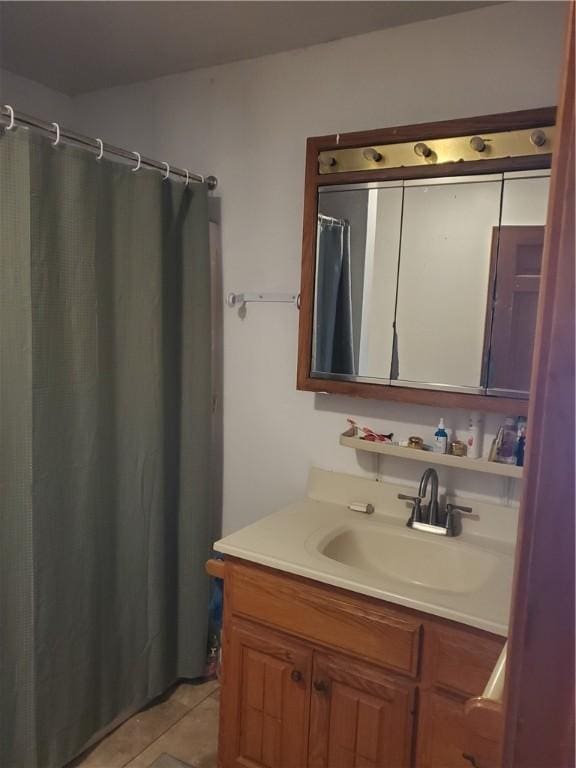 bathroom featuring vanity and tile patterned flooring