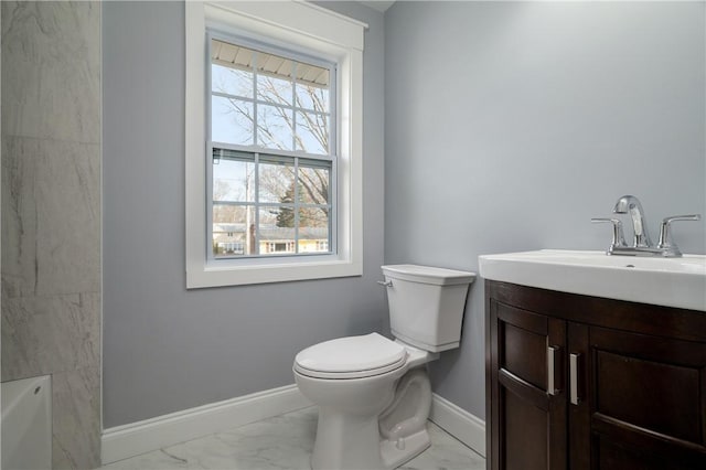 full bath featuring a healthy amount of sunlight, marble finish floor, and baseboards