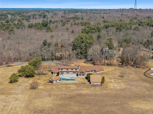 drone / aerial view with a forest view