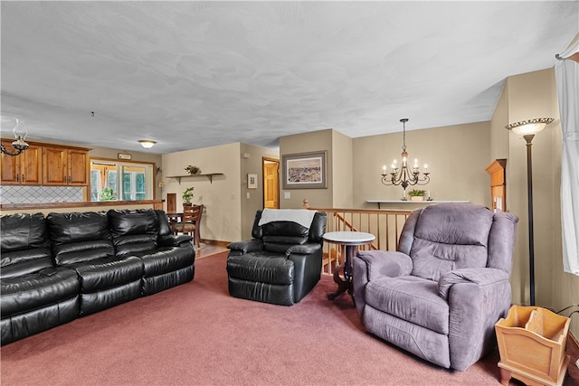 carpeted living room with a notable chandelier