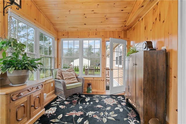 sunroom / solarium featuring wood ceiling