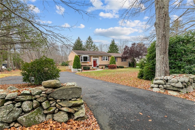 view of front of property with aphalt driveway