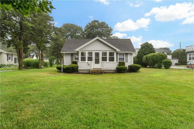 86 Winnapaug Rd, Westerly, RI 02891 - back of property with entry steps, a lawn, and a shingled roof
