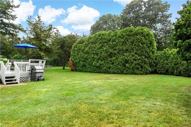 86 Winnapaug Rd, Westerly, RI 02891 - view of green lawn with a deck and view of scattered trees
