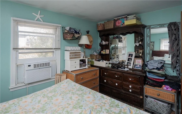 bedroom featuring radiator heating unit and cooling unit