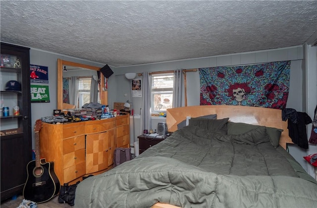 bedroom featuring a textured ceiling