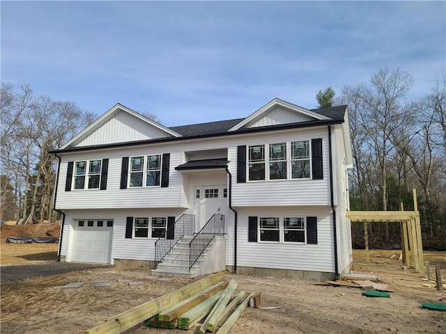 split foyer home featuring an attached garage