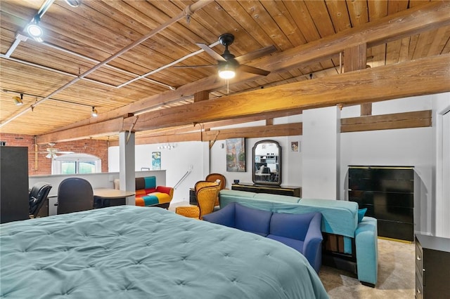 bedroom with beamed ceiling, wood ceiling, and carpet