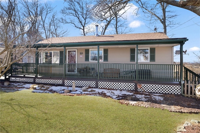 view of front of home featuring a porch and a front yard