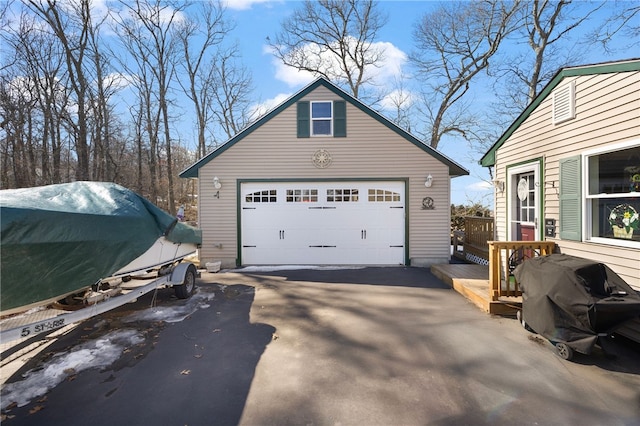 garage featuring driveway