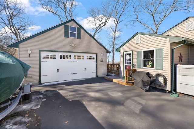 garage featuring driveway