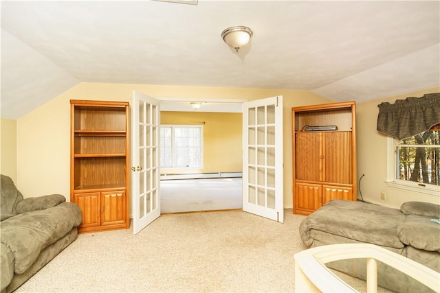 living room with french doors, lofted ceiling, baseboard heating, and carpet