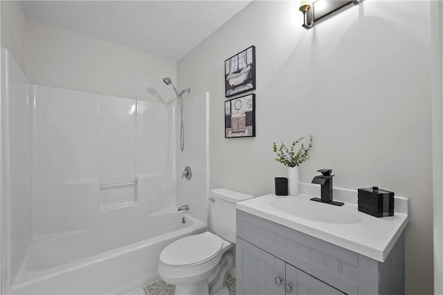 bathroom featuring shower / tub combination, toilet, and vanity