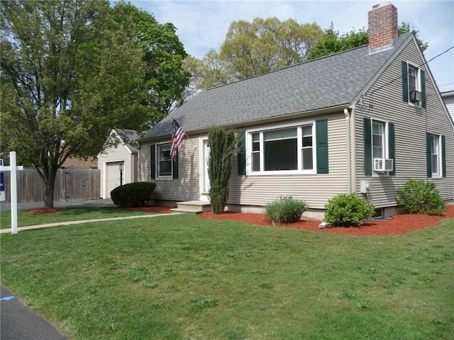 22 Kendall Ln, Warwick, RI 02888 - view of front of home with a chimney, a front yard, a garage, fence, and a shingled roof