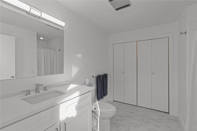 full bath with visible vents, marble finish floor, vanity, and toilet