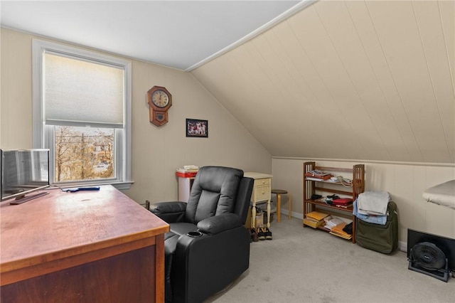 carpeted office space with vaulted ceiling