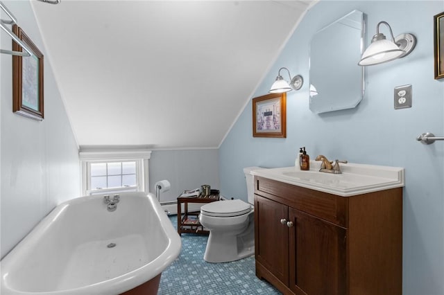 bathroom featuring vanity, lofted ceiling, toilet, and a freestanding bath