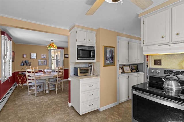 kitchen featuring built in microwave, white cabinets, electric stove, under cabinet range hood, and baseboard heating