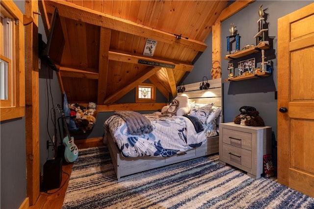 bedroom featuring wooden ceiling and vaulted ceiling with beams