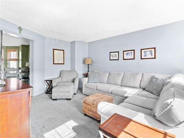 living room featuring light colored carpet