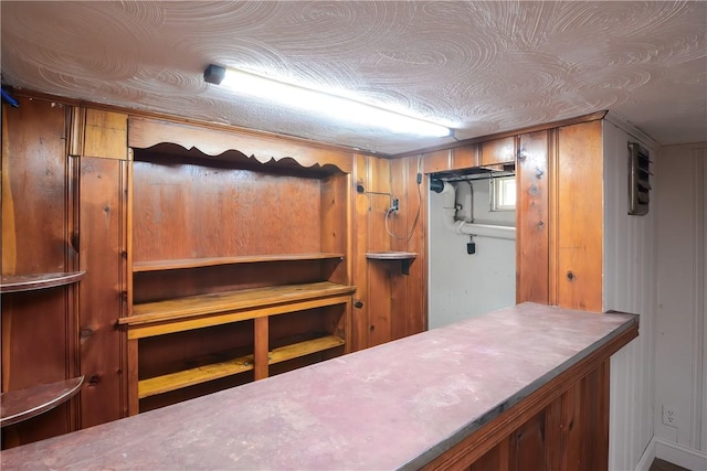 interior space featuring a textured ceiling