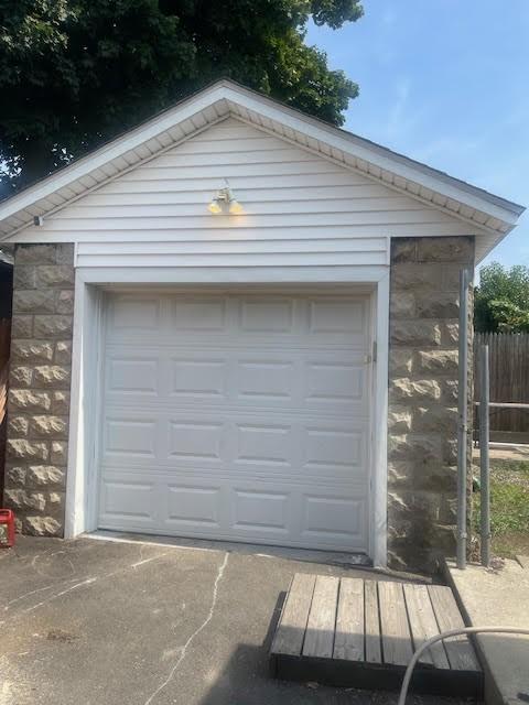 detached garage with fence