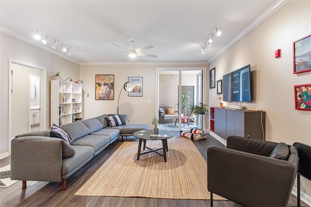 living area featuring a ceiling fan, track lighting, wood finished floors, and ornamental molding