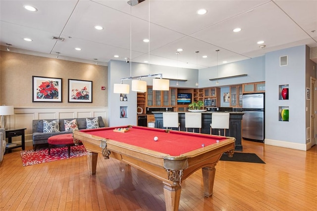 rec room with recessed lighting, billiards, and light wood-style floors