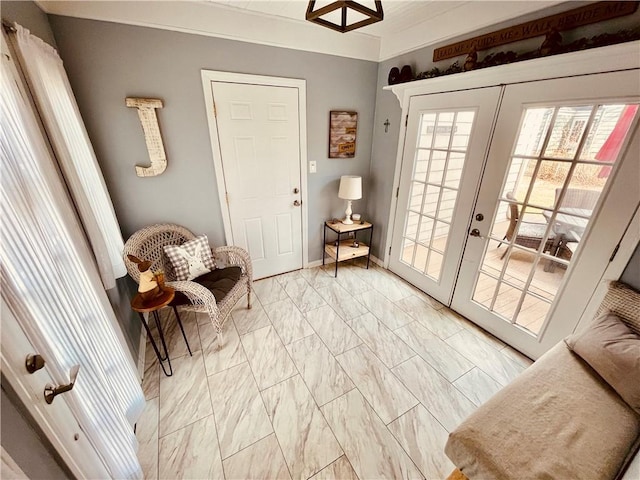 living area with french doors and marble finish floor